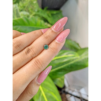 0.88 Ct. Green Sapphire from Madagascar Life Style