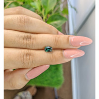 1.16 Ct. Bluish Green Sapphire from Madagascar Life Style