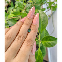 0.82 Ct. Green Sapphire from Madagascar Life Style