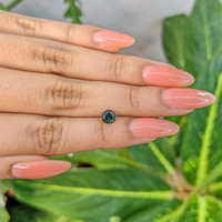 0.98 Ct. Green Sapphire from Madagascar Life Style