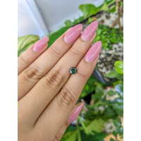 0.94 Ct. Green Sapphire from Madagascar Life Style