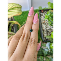 0.99 Ct. Green Sapphire from Madagascar Life Style