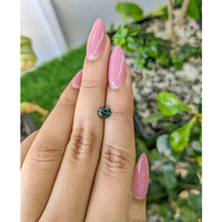 0.92 Ct. Bluish Green Sapphire from Madagascar Life Style