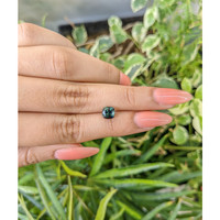 1.46 Ct. Bluish Green Sapphire from Madagascar Life Style