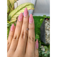 0.66 Ct. Peach Sapphire from Ceylon (Sri Lanka) Life Style