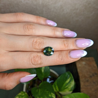 5.23 Ct. Yellowish Green Sapphire from Ceylon (Sri Lanka) Life Style