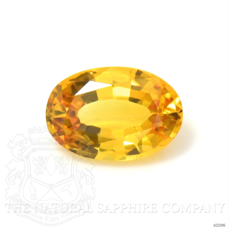 0.60 Ct. Orangish Yellow Sapphire from Ceylon (Sri Lanka)