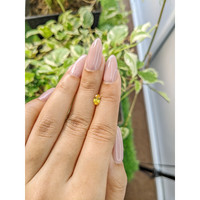 0.56 Ct. Orangish Yellow Sapphire from Ceylon (Sri Lanka) Life Style