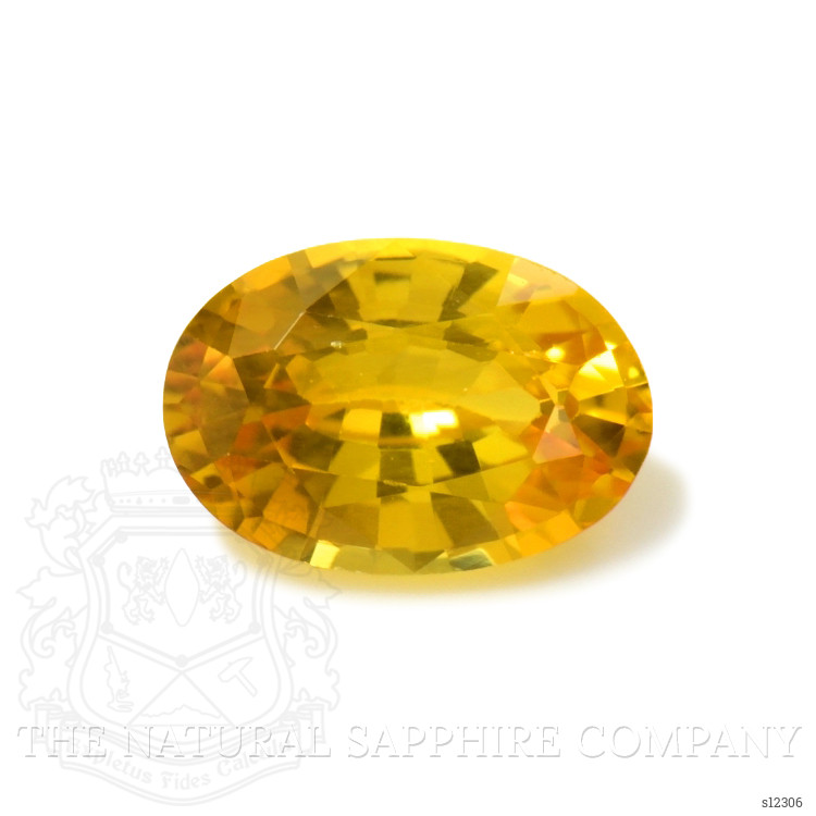 0.65 Ct. Orangish Yellow Sapphire from Ceylon (Sri Lanka)