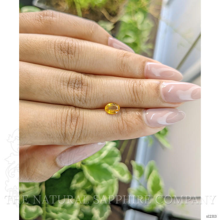0.87 Ct. Yellowish Orange Sapphire from Ceylon (Sri Lanka)