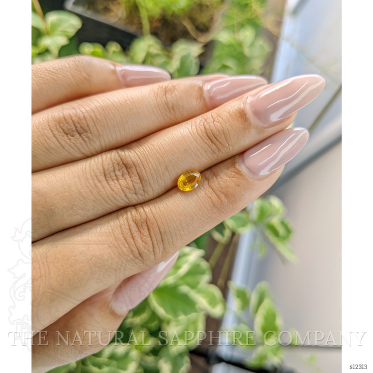 0.87 Ct. Yellowish Orange Sapphire from Ceylon (Sri Lanka)
