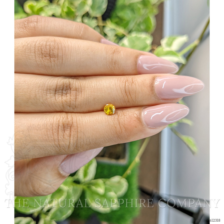 0.44 Ct. Orangish Yellow Sapphire from Ceylon (Sri Lanka)