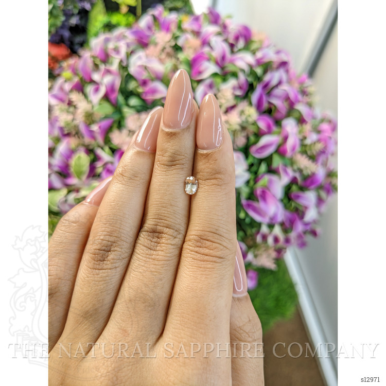 0.61 Ct. Peach Sapphire from Ceylon (Sri Lanka)
