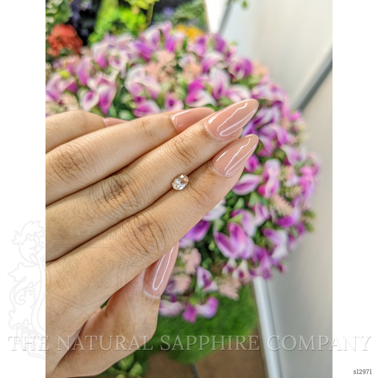 0.61 Ct. Peach Sapphire from Ceylon (Sri Lanka)