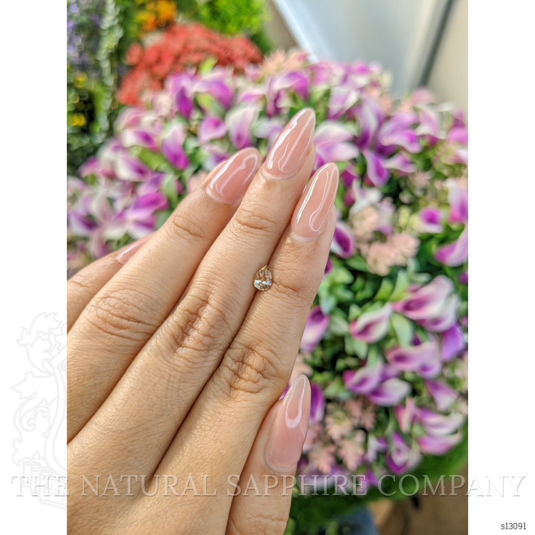 0.57 Ct. Peach Sapphire from Ceylon (Sri Lanka)