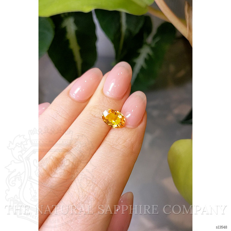 2.10 Ct. Orangish Yellow Sapphire from Ceylon (Sri Lanka)
