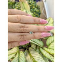 0.75 Ct. Green Sapphire from Madagascar Life Style