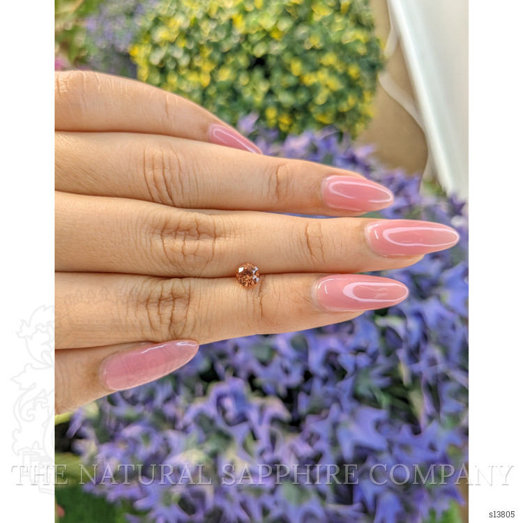 0.68 Ct. Orange Sapphire from Ceylon (Sri Lanka)