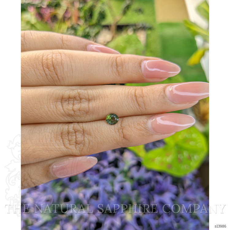 0.64 Ct. Yellowish Green Sapphire from Madagascar