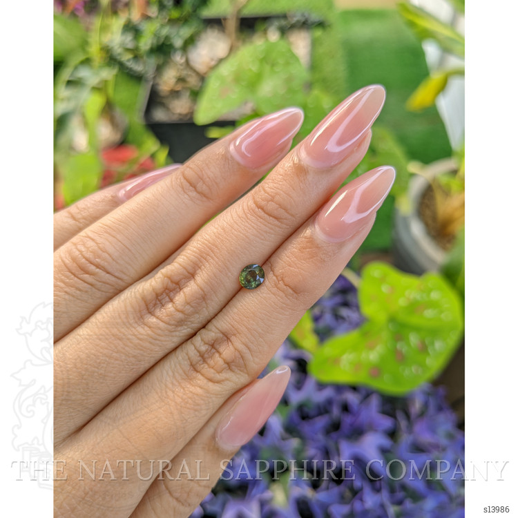 0.64 Ct. Yellowish Green Sapphire from Madagascar