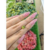 2.06 Ct. Yellowish Green Sapphire from Ceylon (Sri Lanka) Life Style