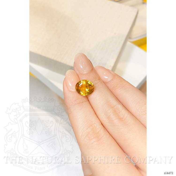 4.61 Ct. Orangish Yellow Sapphire from Ceylon (Sri Lanka)