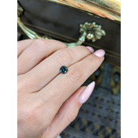 0.91 Ct. Greenish Blue Sapphire from Australia Life Style