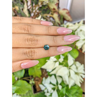 1.47 Ct. Bluish Green Sapphire from Madagascar Life Style
