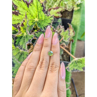 1.93 Ct. Yellowish Green Sapphire from Madagascar Life Style