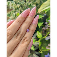 0.63 Ct. Purple Star Sapphire from Ceylon (Sri Lanka) Life Style
