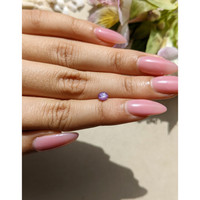 0.63 Ct. Purple Star Sapphire from Ceylon (Sri Lanka) Life Style