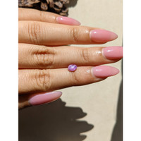 0.91 Ct. Purplish Pink Star Sapphire from Ceylon (Sri Lanka) Life Style