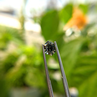 1.25 Ct. Yellowish Green Sapphire from Madagascar Life Style