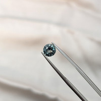 1.10 Ct. Bluish Green Sapphire from Tanzania Life Style