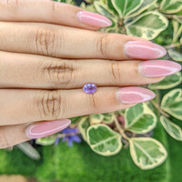 0.58 Ct. Pinkish Purple Sapphire from Ceylon (Sri Lanka) Life Style
