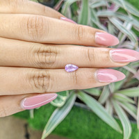 0.77 Ct. Pinkish Purple Sapphire from Ceylon (Sri Lanka) Life Style