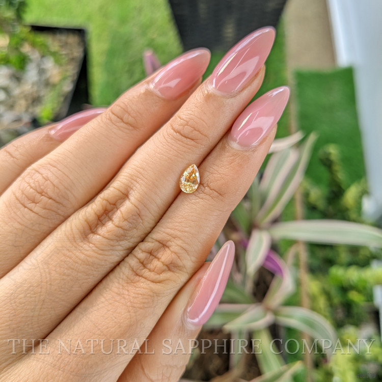 0.80 Ct. Yellowish Orange Sapphire from Ceylon (Sri Lanka)