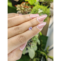 0.68 Ct. Pinkish Purple Sapphire from Ceylon (Sri Lanka) Life Style