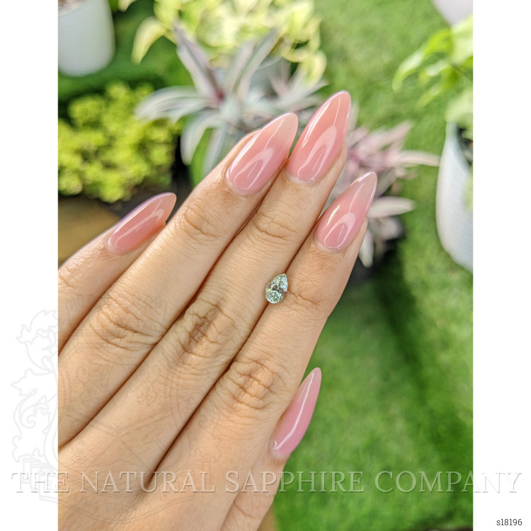 0.78 Ct. Yellowish Green Sapphire from Ceylon (Sri Lanka)