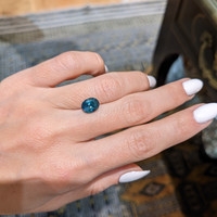 2.54 Ct. Greenish Blue Sapphire from Madagascar Life Style
