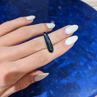 7.79 Ct. Greenish Blue Cabochon Sapphire from Ceylon (Sri Lanka) Life Style