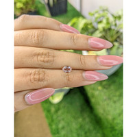 0.84 Ct. Peach Sapphire from Ceylon (Sri Lanka) Life Style