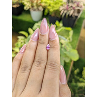 0.66 Ct. Pinkish Purple Sapphire from Ceylon (Sri Lanka) Life Style