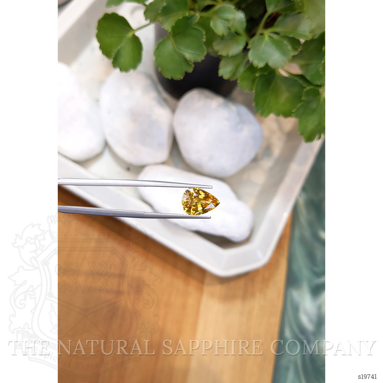 4.07 Ct. Orangish Yellow Sapphire from Ceylon (Sri Lanka)