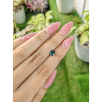 1.00 Ct. Bluish Green Sapphire from Madagascar Life Style