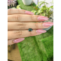 1.41 Ct. Green Sapphire from Madagascar Life Style