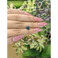 1.69 Ct. Greenish Blue Sapphire from Madagascar Life Style