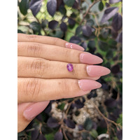 0.91 Ct. Purplish Pink Star Sapphire from Ceylon (Sri Lanka) Life Style