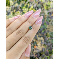 0.74 Ct. Green Sapphire from Madagascar Life Style