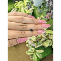 0.92 Ct. Greenish Blue Sapphire from Madagascar Life Style